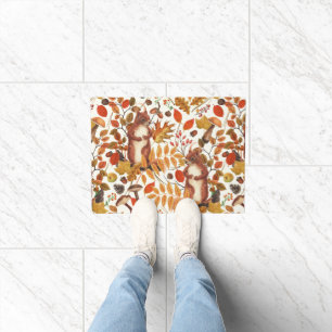 Autumn squirrels and autumnal flora on off white doormat