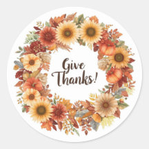 Autumn themed thanksgiving with flowers pumpkins