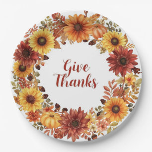 Autumn themed thanksgiving with flowers pumpkins paper plate