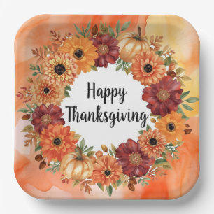 Autumn themed thanksgiving with flowers pumpkins paper plate