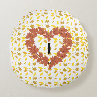 autumn wreath on its bed of leaves round cushion