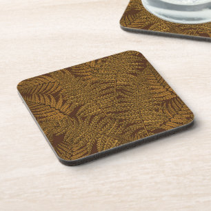 Autumnal fern on brown coaster