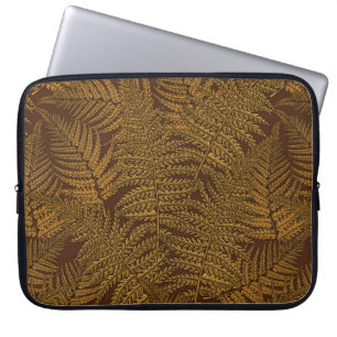 Autumnal fern on brown laptop sleeve