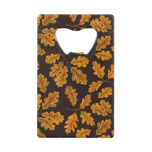 Autumnal oak leaves on dark brown