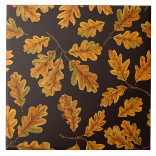 Autumnal oak leaves on dark brown tile