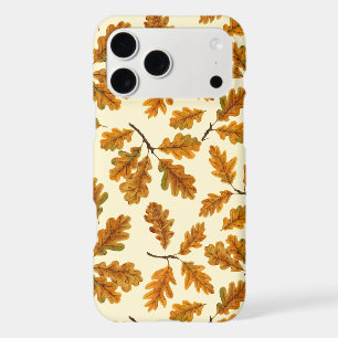 Autumnal oak leaves on off white