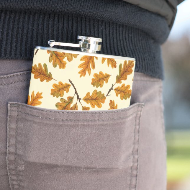 Autumnal oak leaves on off white hip flask (In Situ)