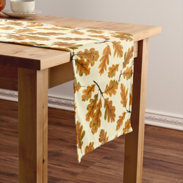 Autumnal oak leaves on off white short table runner (In Situ)