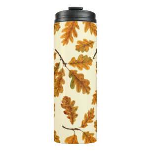 Autumnal oak leaves on off white thermal tumbler
