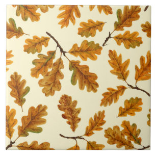 Autumnal oak leaves on off white tile