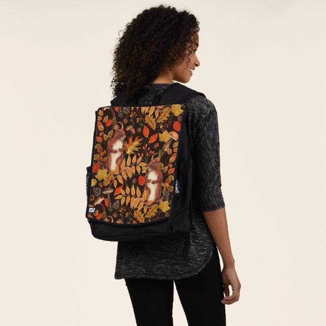 Autumnal squirrels and flora on dark brown backpack (Worn)