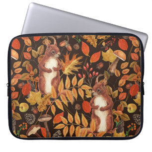 Autumnal squirrels and flora on dark brown laptop sleeve