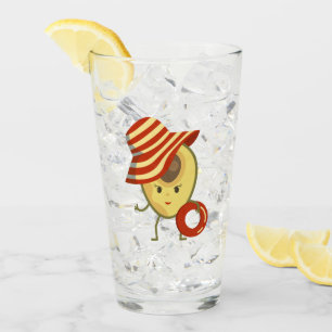 Avocado beach girl with sun hat and swim ring glass