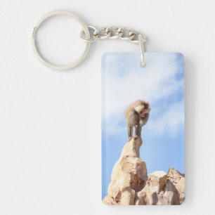 Baboon monkey on top of a mountain key ring