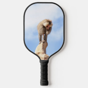 Baboon monkey on top of a mountain pickleball paddle