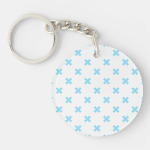 Baby blue cross stitches on white key ring