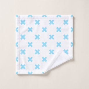 Baby blue cross stitches on white wash cloth