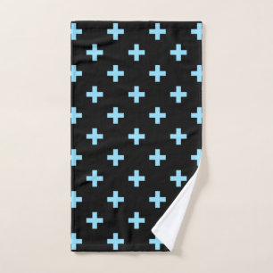 Baby blue polka crosses on black hand towel