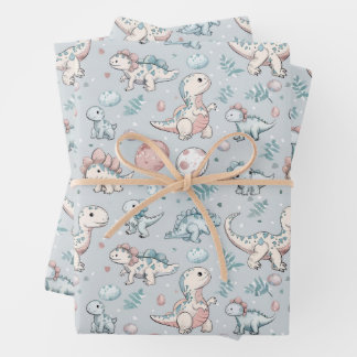 Baby dinosaurs on blue wrapping paper sheet