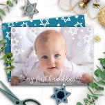 Baby First Hanukkah Photo Star of David Script Holiday Card<br><div class="desc">“My First Hanukkah.” A playful visual of white snowflakes, Stars of David and handwritten script typography, overlaying the photo of your choice, help you usher in Hanukkah and New Year. On the back, additional white snowflakes overlay a teal blue background. Feel the warmth and joy of the holiday season whenever...</div>
