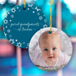 Baby First Hanukkah Stars Snowflakes Grandparents Ceramic Tree Decoration<br><div class="desc">“First Hanukkah.” A playful visual of white Stars of David, snowflakes and handwritten script typography with customized year, overlaying the photo of your choice, help you usher in Hanukkah and New Year. On the back, additional white Stars of David, snowflakes and handwritten typography with “proud grandparents of baby’s name” overlay...</div>