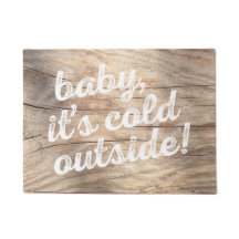 baby, it's cold outside! on light wood background