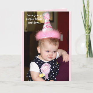 Baby looking grumpy at her first birthday party card