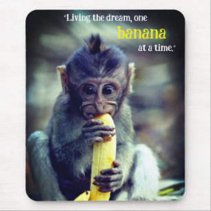 Baby Monkey Eating Banana Mouse Pad