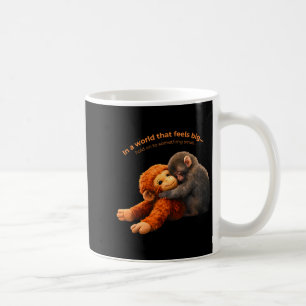 Baby monkey punch team punch hold on to something coffee mug