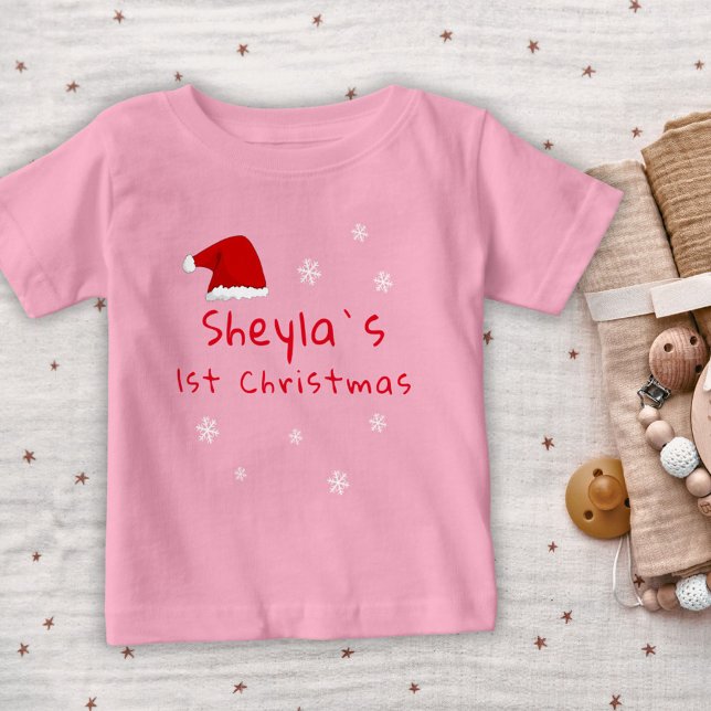 Baby`s First Christmas Santa Hat Snowflakes Baby T-Shirt (Creator Uploaded)