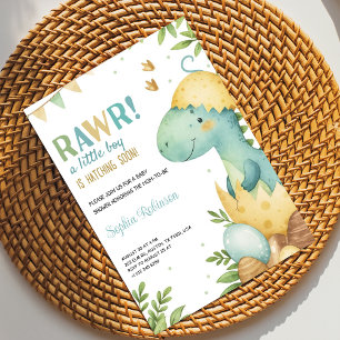 Baby shower invitation featuring a dinosaur