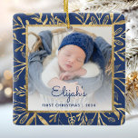 Babys 1st Christmas Photo Navy Blue Gold Foliage Ceramic Ornament<br><div class="desc">Celebrate baby's first Christmas with this beautiful keepsake ornament. Easily replace the sample image with your own favourite photo and customise it with baby's name in navy blue script font and the year below. A white gradient screen helps make the text pop. The photo is set off by an elegant...</div>