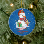 Baby's First Christmas cute snowman modern colour Ceramic Tree Decoration<br><div class="desc">A whimsical Christmas tree ornament featuring an adorable snowman surrounded by delicate snowflakes. Customise it with your child's name and the year for a personalised touch that captures the joy of the season.
use the "Personalise this template" button to change the name and year of the newborn.</div>