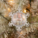 Baby's First Christmas Holiday Snowflake Pewter Christmas Ornament<br><div class="desc">This charming baby's first Christmas holiday snowflake ornament features your baby's photo, name or any other message and BLESSED on the front (can be deleted.) PHOTO TIP: Crop your high resolution photo into a square as you want it to appear on the ornament BEFORE you upload it. CHANGE the saying,...</div>