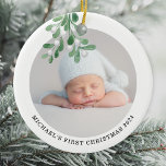 Baby's First Christmas Photo Ceramic Tree Decoration<br><div class="desc">This Baby's First Christmas Ornament is decorated with watercolor mistletoe.
Easily customisable with your baby's photo,  name,  and year.
Use the Design Tool to change the text size,  style,  or colour.
Original Watercolor © Michele Davies.</div>
