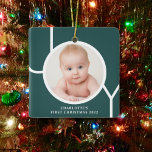 Baby's First Christmas Photo Green  Ceramic Ornament<br><div class="desc">This stylish Baby's First Christmas Photo Ornament is decorated with the word JOY in white on a green background.
Easily customisable with your photo and name.</div>