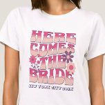 Bachelorette Party Here Comes The Bride Groovy T-Shirt<br><div class="desc">Make a splash at your upcoming bachelorette party with this stunning bachelorette party personalised t-shirts. Whether you're celebrating a bach trip, a girls' vacation, or a best friends' holiday, this custom beach bachelorette party t-shirts are the perfect addition to your unforgettable getaway. Add a personal touch to your bachelorette party...</div>