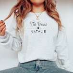 Bachelorette Party Team Bride Personalised Bridal Sweatshirt<br><div class="desc">Elevate your bachelorette party experience with our Team Bride Personalised Bridal Crewneck Sweatshirt – the epitome of style, comfort, and customisation! This must-have addition to your bachelorette party wardrobe encompasses all the key attributes to make your celebration unforgettable. Dress your bride squad in these chic bachelorette party shirts that double...</div>