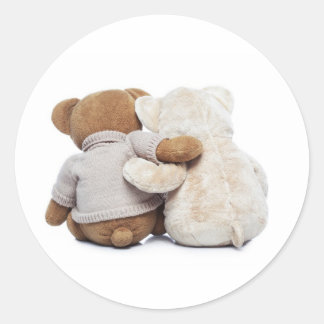 Back view of two Teddy bears hugging each other Classic Round Sticker