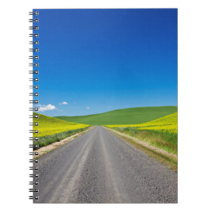 Backcountry road through Spring Canola Fields Spiral Notebook