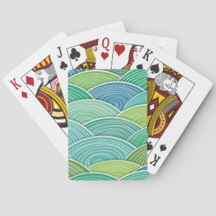 Background of curled abstract green waves playing cards