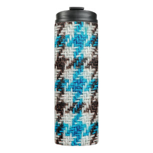 Background of flannel fabric texture. thermal tumbler