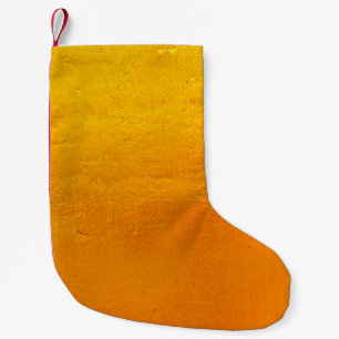 Background of gold wallpaper texture graphic desig small christmas stocking