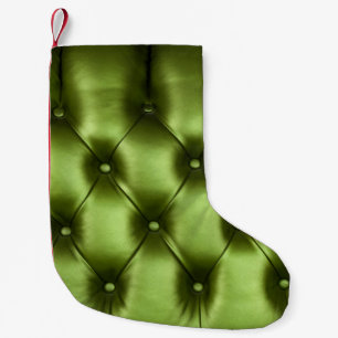 Background texture of dark green capitone genuine small christmas stocking