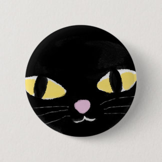 Badge with cat's eyes.