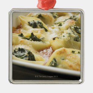 Baked pasta shells with spinach filling metal tree decoration