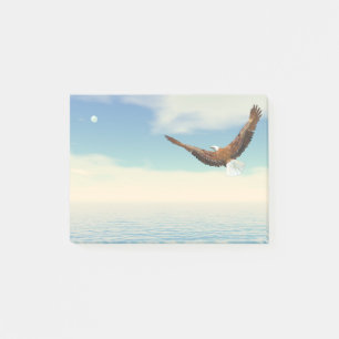 Bald eagle flying upon the ocean to the moon post-it notes