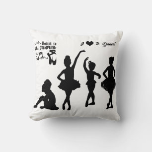 Ballerina throw pillow in white and black.