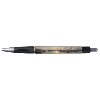 ballpoint pen at sea at sunset