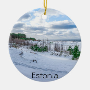 Baltic sea coast covered in snow in winter ceramic tree decoration